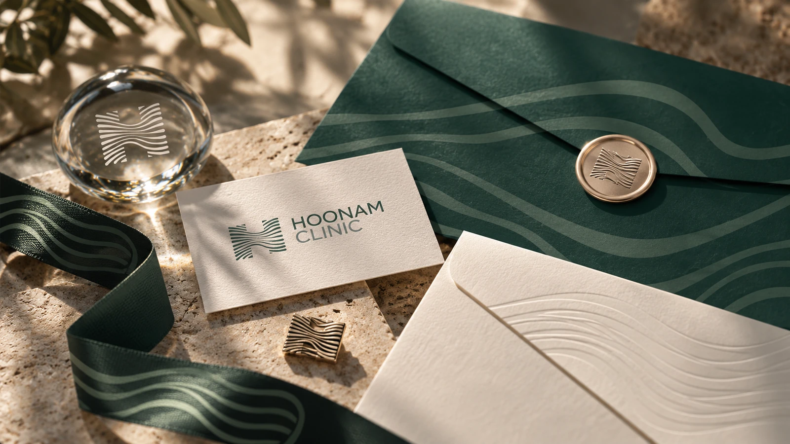 Hoonam stationery, wave-patterned ribbon, metal pin and paper correspondence