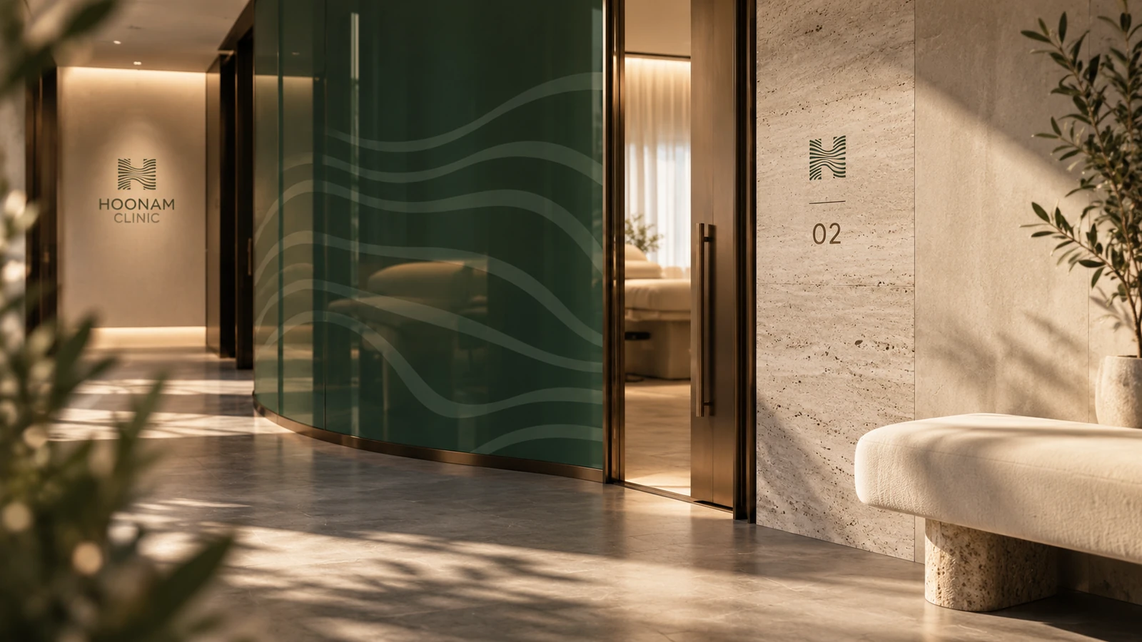 Hoonam corridor concept with etched privacy glass and restrained room signage