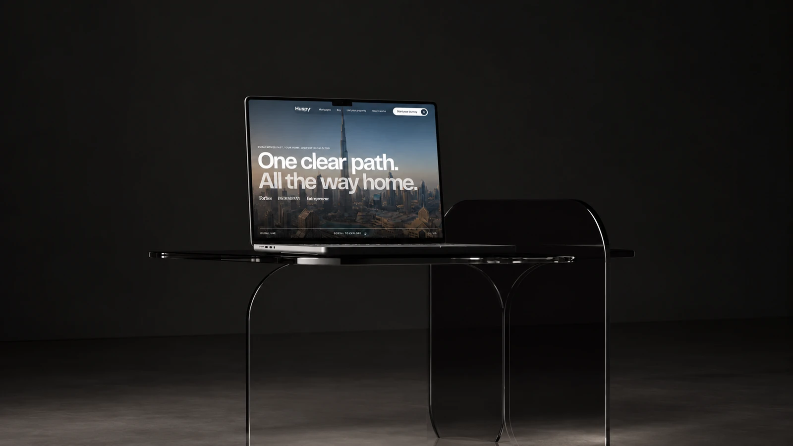 Huspy skyline homepage on a laptop in a dark minimal interior
